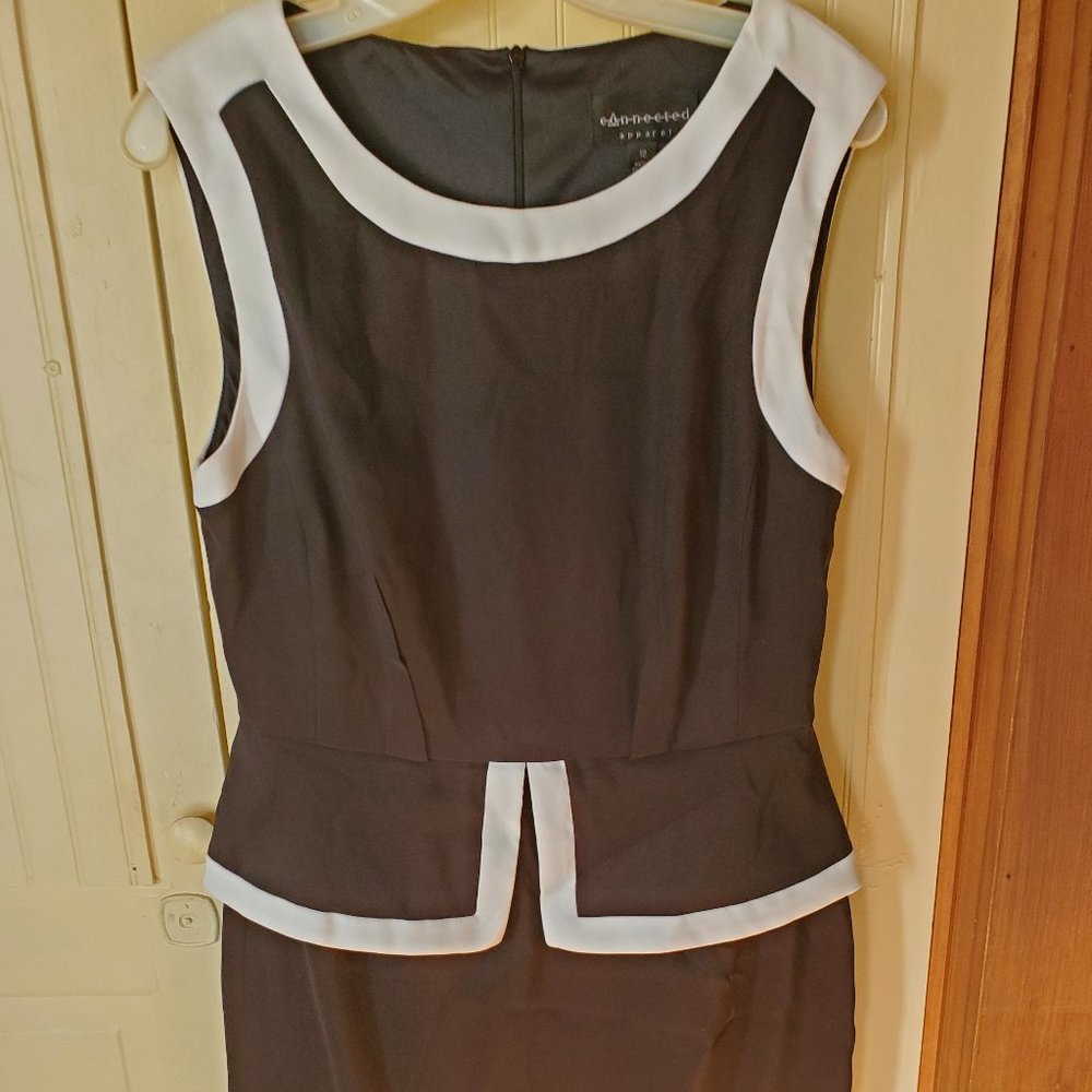 Peplum Style Black dress with light cream trim, size 12
